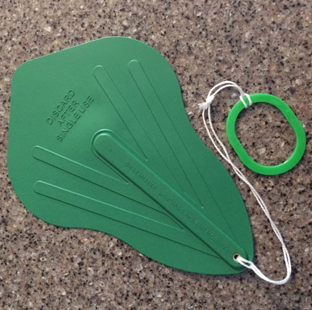 A Green Plastic Fan With A String